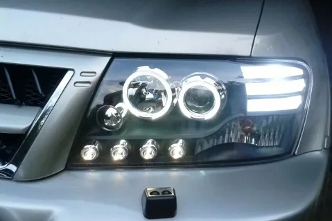 Кристални фарове за Mitsubishi Pajero (2001-2006) - черни Кристални фарове за Mitsubishi Pajero (2001-2006) - черни